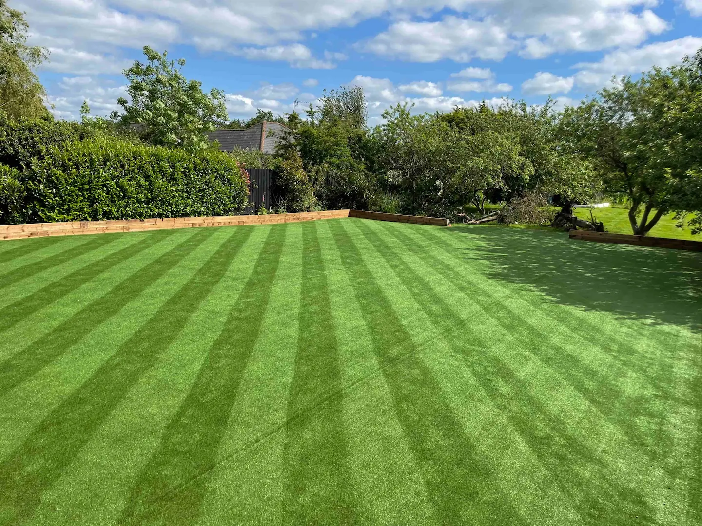 Artificial pitch lawn in Essex with stripes