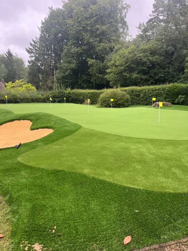 Artificial grass putting green with bunker